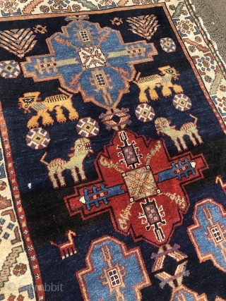 Look at the lions and giraffes in this playful and lovely antique Persian Bakhtiary tribal rug, size: 195x120cm / 6'4''ft x 4ft           