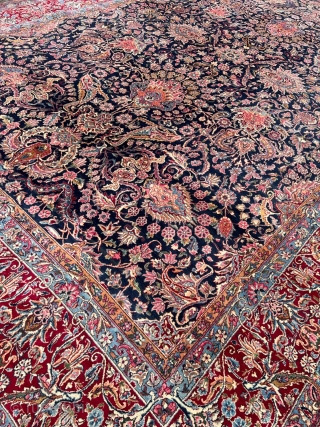 A highly decorative large antique Persian Kirman carpet, size: circa 520x345cm / 17’1ft by 11’3ft beautiful color combination, navy blue field color and a very well executed floral design. http://www.najib.de
   