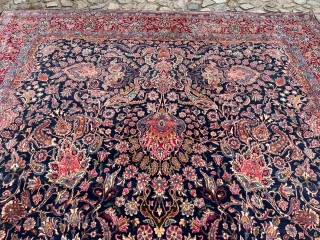 A highly decorative large antique Persian Kirman carpet, size: circa 520x345cm / 17’1ft by 11’3ft beautiful color combination, navy blue field color and a very well executed floral design. http://www.najib.de
   