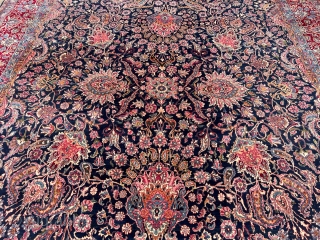 A highly decorative large antique Persian Kirman carpet, size: circa 520x345cm / 17’1ft by 11’3ft beautiful color combination, navy blue field color and a very well executed floral design. http://www.najib.de
   