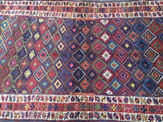 Antique Kurdish Saujbulagh tribal rug with fantastic colors and shiny wool. Circa 1870. Size: ca. 260x140cm / 8'5'' x 4'6''ft The design of this village weaving displays interlocking stepped diamonds that completely  ...