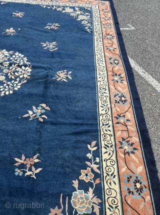 Antique Chinese Peking rug. Very decorative, beautiful blue field color, salmon border. Age: circa 1900, size: ca. 405x310cm / 13’3ft by 10’2ft , some localized wear. www.najib.de      