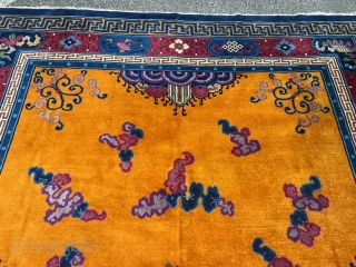 Very decorative antique Chinese carpet, beautiful tangerine field color. Size: ca. 415x320cm / 13’6ft by 10’5ft http://www.najib.de                