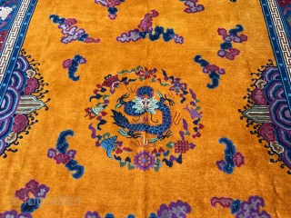 Very decorative antique Chinese carpet, beautiful tangerine field color. Size: ca. 415x320cm / 13’6ft by 10’5ft http://www.najib.de                