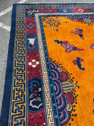 Very decorative antique Chinese carpet, beautiful tangerine field color. Size: ca. 415x320cm / 13’6ft by 10’5ft http://www.najib.de                