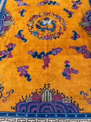 Very decorative antique Chinese carpet, beautiful tangerine field color. Size: ca. 415x320cm / 13’6ft by 10’5ft http://www.najib.de                