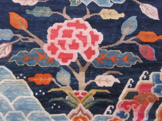 Tibetan : Khaden : Lotuses and other floral elements on saturated indigo ground. Tree of life motif. Foldover shot shows some small repair to lower selvedge, c.1930      