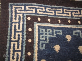 Tibetan Khaden- pre-1900, 27 by 54 inches, classic design in shades of indigo. some re-weaves                  