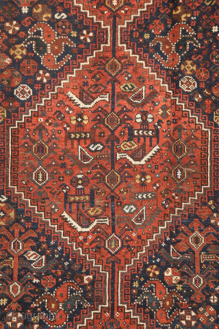 A close inspection of this antique Arab rug woven in the Shiraz area reveals a fascinating design. At first glance, it appears to be a typical example of the Arabs from Fars  ...