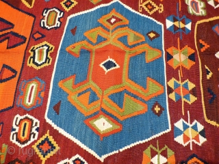 A remarkable antique Qashqai kilim with a dramatic design consisting of three large medallions, and the field filled with scattered motives throught.  The wool soft, shinny and finelly spun.In mint condition.  ...