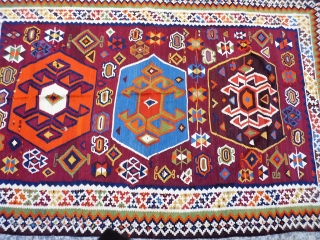 A remarkable antique Qashqai kilim with a dramatic design consisting of three large medallions, and the field filled with scattered motives throught.  The wool soft, shinny and finelly spun.In mint condition.  ...