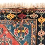 A Qashqai tribe rug with a central medallion, a central field full of floral bouquets, even the borders are arranged with flowers. All dyes are natural, achieving a pretty range of terracotas,  ...