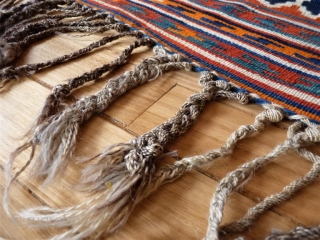  kilim from the beggining of the 20th century in mint condition, including the fringe area. All dyes are natural and for the background of the central field, a terracotta hue has  ...