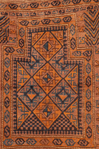 A superb Afghan Baluch rug from Afghanistan. The wool is soft and shinny, of the best available quality. The central field is with a trellis motif and the rug is with multiple  ...