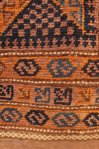 A superb Afghan Baluch rug from Afghanistan. The wool is soft and shinny, of the best available quality. The central field is with a trellis motif and the rug is with multiple  ...