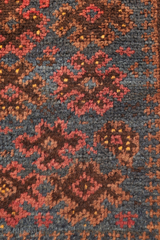 A beautiful antique Baluch prayer rug with a lovely deep blue colour. The main motifs apper to be floating in the main field. The sheeps wool is soft, shinny and glossy. The  ...