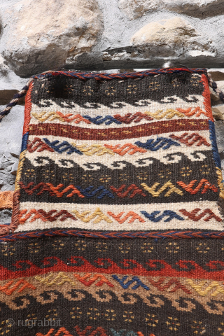 When the back can be more interesting than the front... ¡click to see all the images!
This lovely Qashqai namakdan or salt bag was woven with a combination of natural undyed wool and  ...