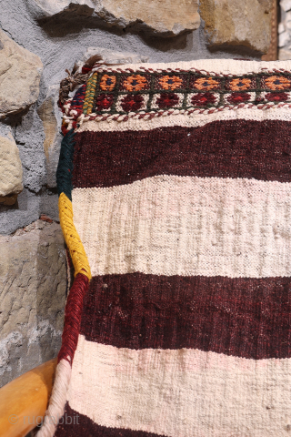 A saddlebag woven by Arabic woman from South West Iran with the soumak technique. The colours achieved using dyes natural dyes are very nice. This saddlebag is very thick and heavy and  ...