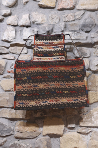 When the back can be more interesting than the front... ¡click to see all the images!
This lovely Qashqai namakdan or salt bag was woven with a combination of natural undyed wool and  ...