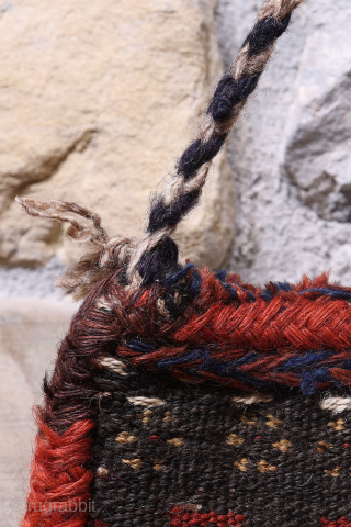 When the back can be more interesting than the front... ¡click to see all the images!
This lovely Qashqai namakdan or salt bag was woven with a combination of natural undyed wool and  ...