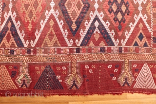 A kilim from the Obruk region, very finelly woven combining plain weave with cicim technique. The desing is composed of a well organised central field with two asimetric borders, both in terms  ...