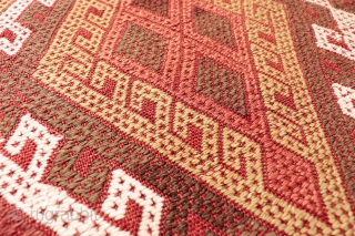 A kilim from the Obruk region, very finelly woven combining plain weave with cicim technique. The desing is composed of a well organised central field with two asimetric borders, both in terms  ...