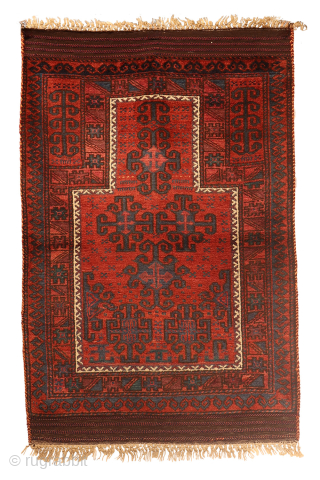 A fantastic antique Afghan Baluch prayer rug. The design is creative and unusual. The wool is of superior quality, soft and shinny and dyed with natural dyes. The rug has a couple  ...