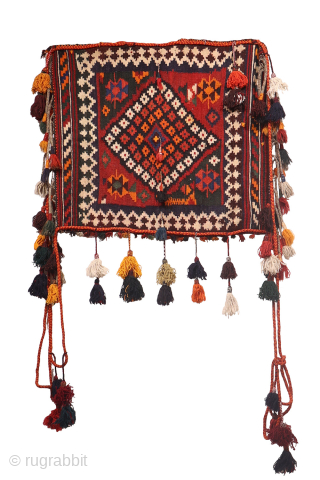 A hard to find Arabic baby craddle. This extraordinary little kilim was used as a hammock whilst the mother was weaving, cooking, tending the herds etc. The long tassels had a double  ...