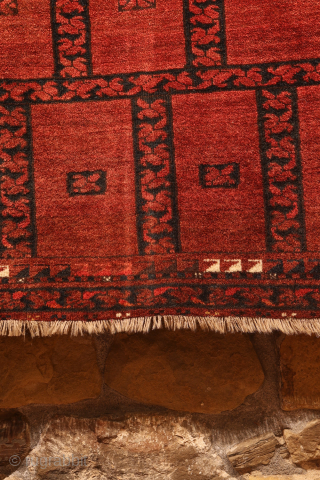 An antique Ersari Turkman squarish rug. This rug is woven with an unusual design of square compartments, each square having a set of leaves dividing the squares. The rug has some interesting  ...