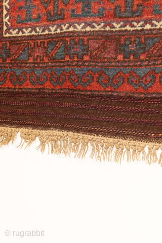 A fantastic antique Afghan Baluch prayer rug. The design is creative and unusual. The wool is of superior quality, soft and shinny and dyed with natural dyes. The rug has a couple  ...