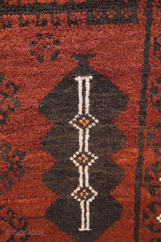 A very unusual design for this antique Baluch rug from Afghanistan. This rug from the 1920s sports a  surprising design with a central tree of life motif with camel caravans in  ...