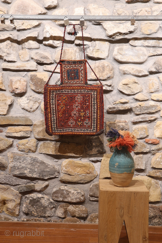 A superb antique Arab namakdan or salt bag woven with the soumak technique from Iran. All the dyes are natural, with a particularly beautiful indigo blue. The lower corners are probably worn,  ...