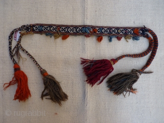 Qashqai Kashkuli horse neck band, 54x5cms, excellent condition, intact original band from about 1920, natural colours, with additional plaited tassles (blue and orange) added at a later date to looped strands at  ...