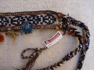 Qashqai Kashkuli horse neck band, 54x5cms, excellent condition, intact original band from about 1920, natural colours, with additional plaited tassles (blue and orange) added at a later date to looped strands at  ...