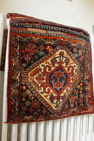 This antique saddlebag was very tightly woven by a Qashqai master weaver with natural dyes. In mint condition.
Material: 100% hand-spun sheep wool
Size: 110×60 cms
Origin: Qashqai tribe, Iran

You can purchase this saddlebag directly  ...