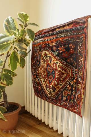 This antique saddlebag was very tightly woven by a Qashqai master weaver with natural dyes. In mint condition.
Material: 100% hand-spun sheep wool
Size: 110×60 cms
Origin: Qashqai tribe, Iran

You can purchase this saddlebag directly  ...