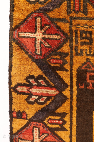 A one of a kind vintage war rug with a huge tank as the central motif. In the field airplanes, guns and granades can be found. There is plenty of writing throught  ...