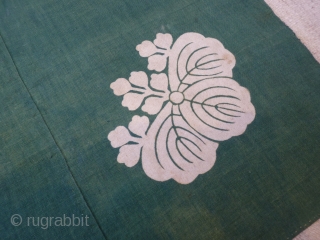 Japanese "Furushiki" cotton cloth, which was folded and tied for carrying small objects. Made from three strips of cloth hand stitched together. a "kamon" stylised flower family crest was drawn in rice  ...