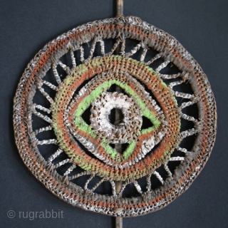 Set of 2 yam decorations cod. 0530. Woven cane, natural pigments. Abelam people. East Sepik area. Circa 1960's. Very good condition. Diam. cm. 20 (8") each. This pair of woven cane circular  ...