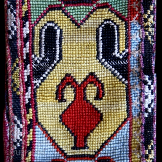 Cross stitch embroidered belt or robe trim cod. 0668. Silk, cotton, traditional dyes backed with ikat. Central Asia.19th. century. Cm. 108 x 9 (3’6” x 4”). Very good condition.
Robe trim made in  ...