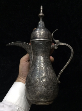 Antique arabic style coffe/tea pot from Saudi Arabia.
High quality silver ( 90% )  , there is a hallmark at the bottom of the pot and on the tea pot head cover  ...