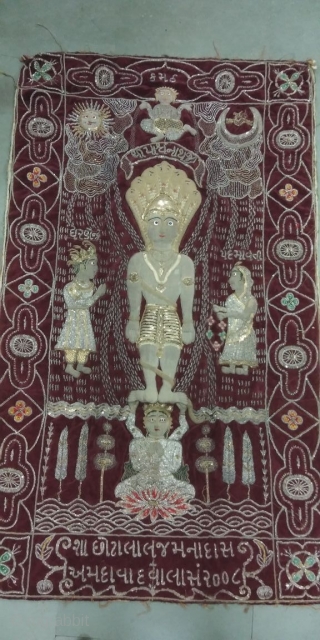 Real silver and gold foil work of Jain temple hanging hand embroidered from Gujarat India the size of the hanging is 23 inches X 37 inches.       