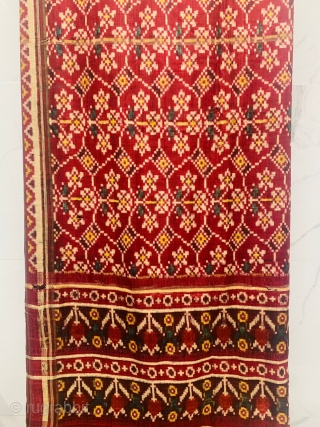 An Rare Theen phool bhat Patola Sari, Double Ikat silk from Patan Gujarat 1850 - 1875 c .This Patola known as Theen phool bhat three flowers design.This Patola has one of the  ...