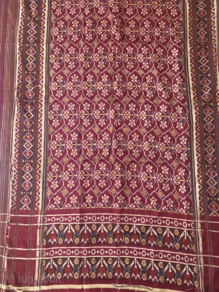 An Rare Theen phool bhat Patola Sari, Double Ikat silk from Patan Gujarat 1850 - 1875 c .This Patola known as Theen phool bhat three flowers design.This Patola has one of the  ...