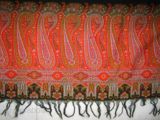 This Victorian shawl is made from a woven paisley design, it has self fringe on 2 ends. no stain in this item, but one small hole or tears. it is still a  ...