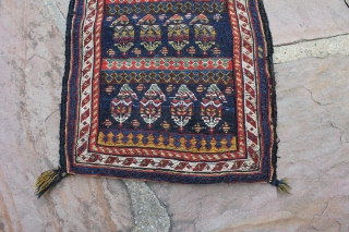 A top Qashqai spindle bag made using a flat-weave technique and all natural dyes. It measures 1.1 x1.7 Ft

The front is made up of repeating row of the famous boteh motif made  ...