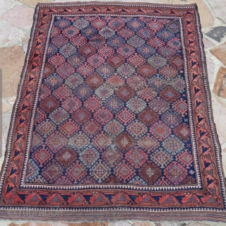  Old well into the 19th century Baluch Timuri with a great main border.

Size is 5 x 5.11 ft not including the kilim finish.         