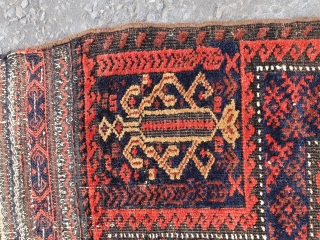 This is a unique Baluch prayer rug that measures 148x90 CM. It has a border design used in the field which is very unique and is flanked by leaf motifs protruding from  ...