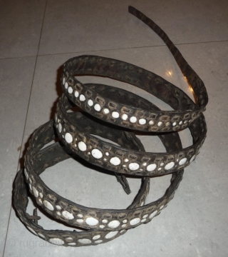 this is a rare old leather belt with conch inlay made by the lisu people of southwest china near the myangmar border and was worn by some men of this group. the  ...