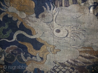 rarely has a brocade the look of a kesi (tapestry weave). beautifull  fragment of a 17th century silk brocade. wonderfull drawing and palette. tibetan patchwork but originally possibly part of a  ...